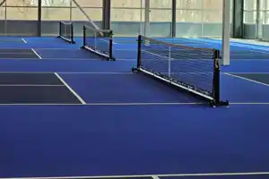 Club-grade indoor pickleball courts at Court X, Oakville. Premium surfacing by TSS Pickleball for elite-level play and performance.