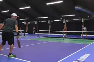 Seniors and adults enjoy playing on TSS Pickleball’s rollout courts in Sault Ste. Marie, ON—durable competitive courts designed for community and club play.