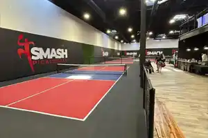 Custom indoor pickleball courts at Smash Pickleball franchise in London, ON, with high-performance surfacing by TSS Pickleball.