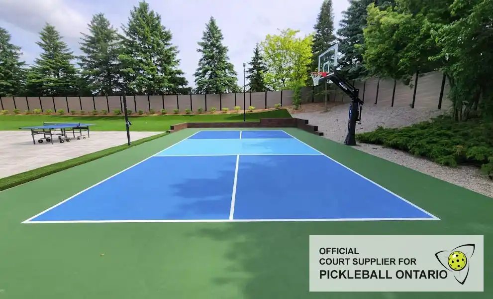 Custom backyard pickleball and basketball court in Cambridge, Ontario, by TSS Pickleball — Official Court Supplier for Pickleball Ontario